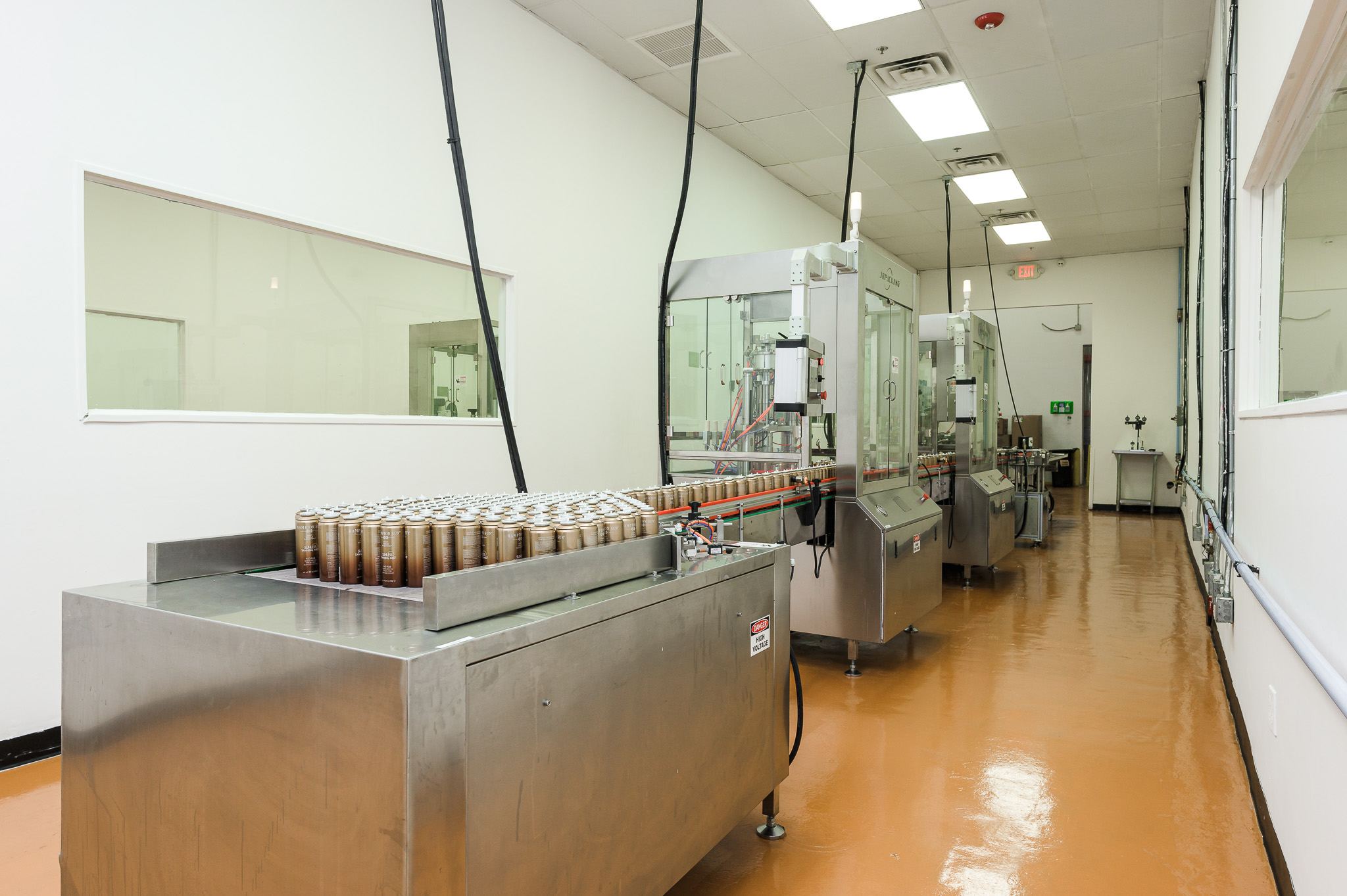 Aerosol can filling line at InSpec