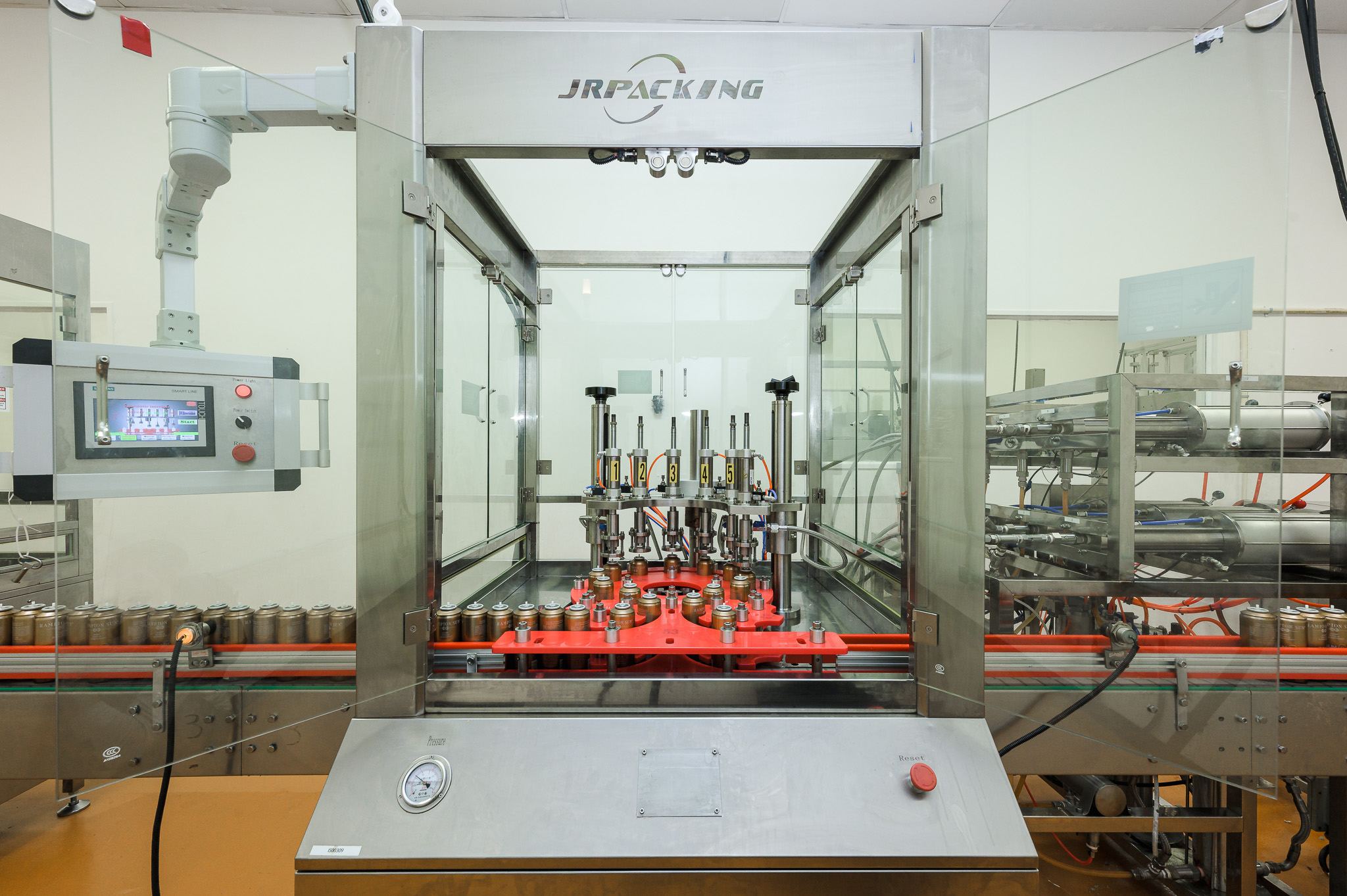 Rotary aerosol filling machine on the production line