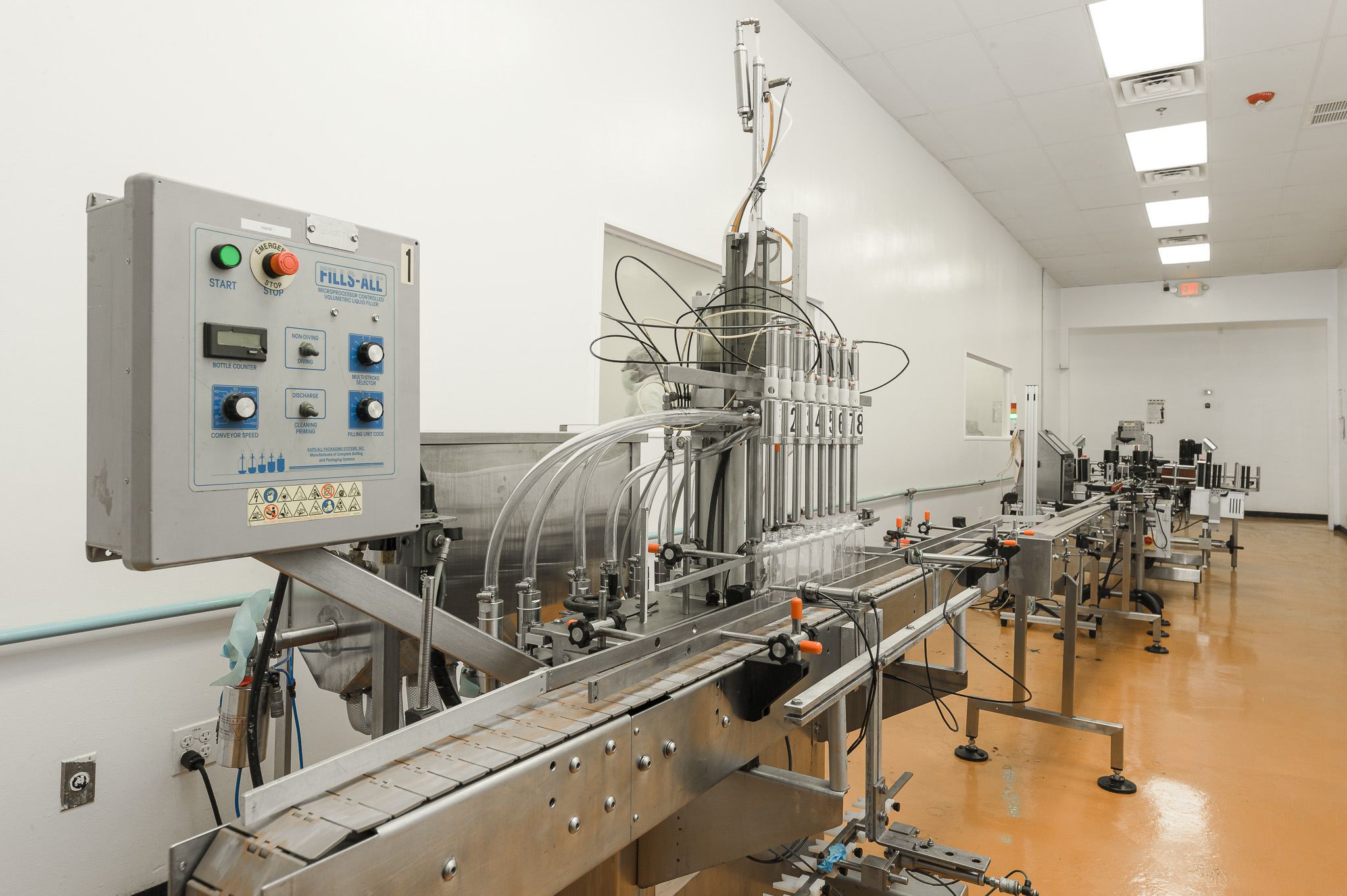Multi-head automated filling line in operation